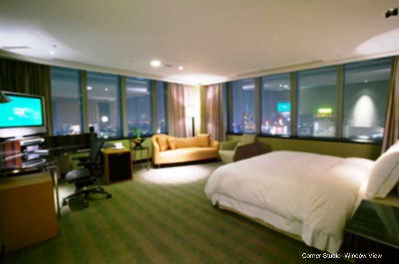 The Landis Taichung Hotel Kültér fotó A room at the hotel
